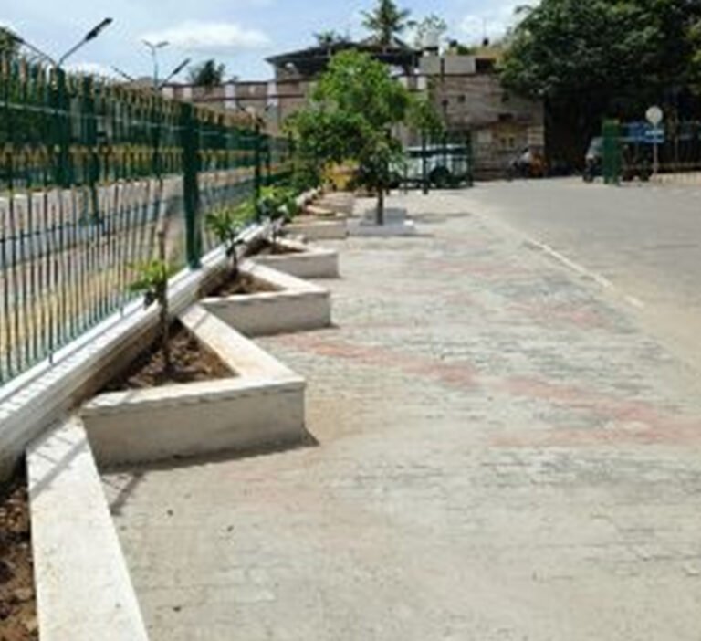 Construction of parking area and foot path infront of DC office at mandya city